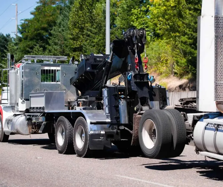 heavy-duty wrecker on a Osler highway shoulder
